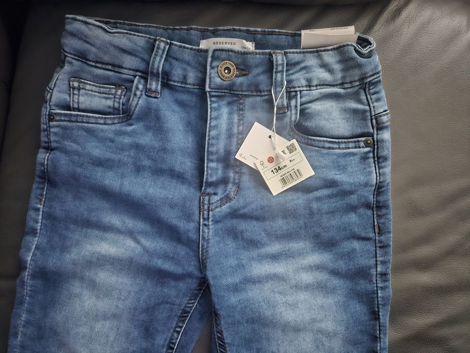 Nowe spodnie jeans reserved 134