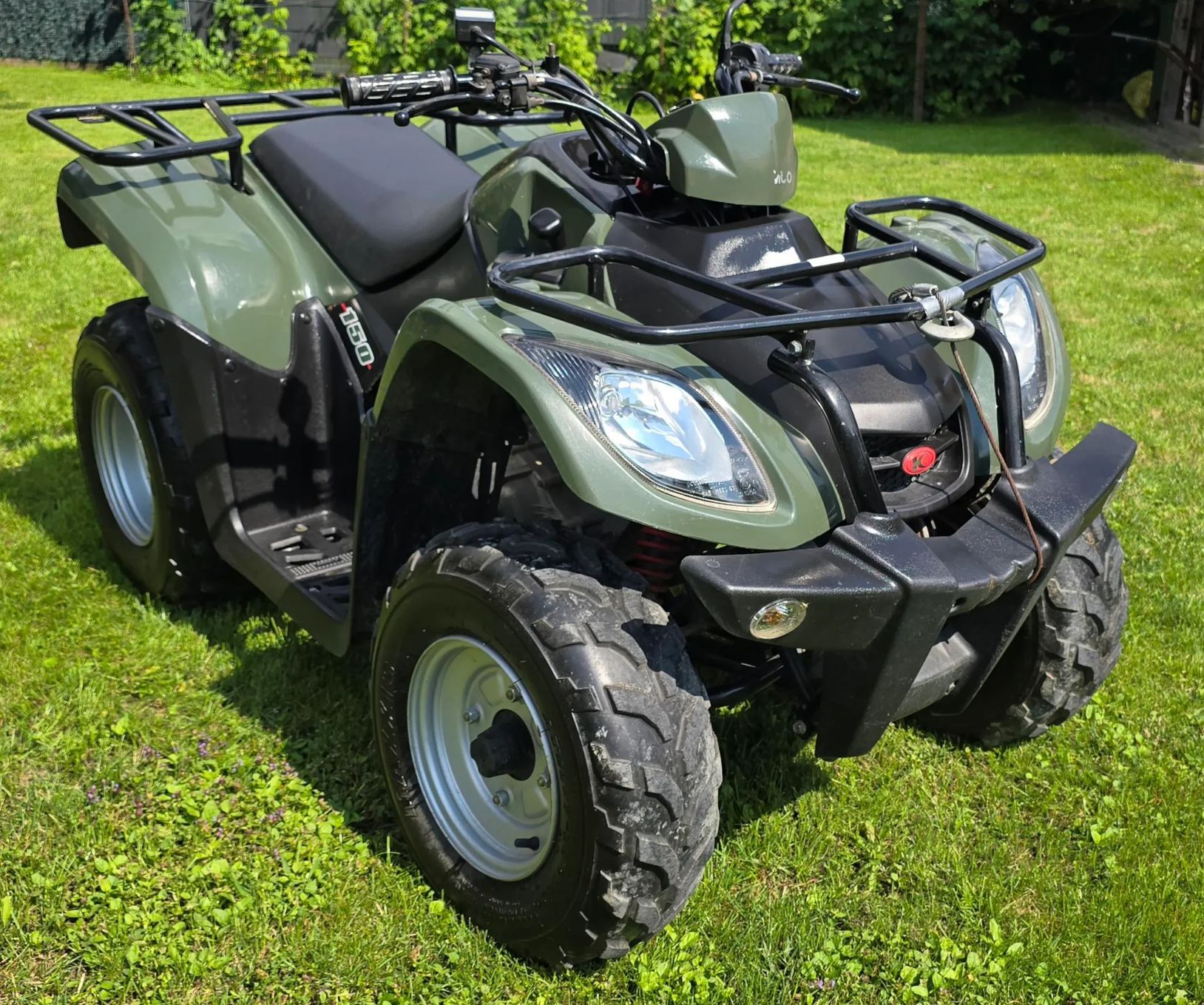 Kymco MXU Quad Kymco z homologacją, wyciągarką i pługiem.