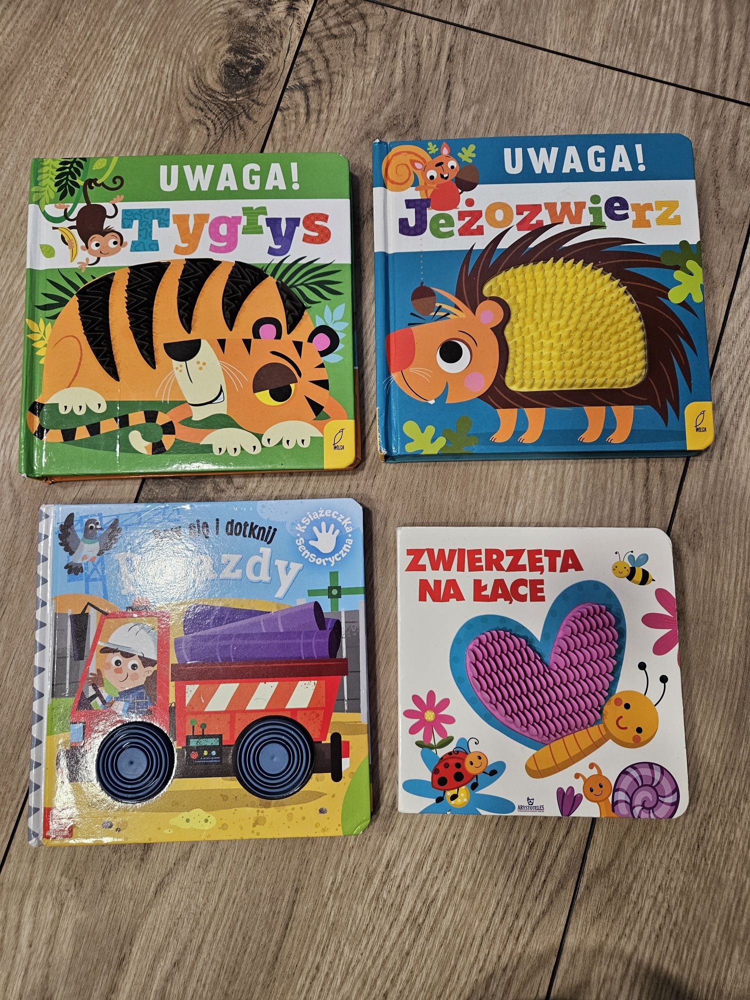 Książki książeczki sensoryczne książka uwaga tygrys jeżozwierz pojazdy