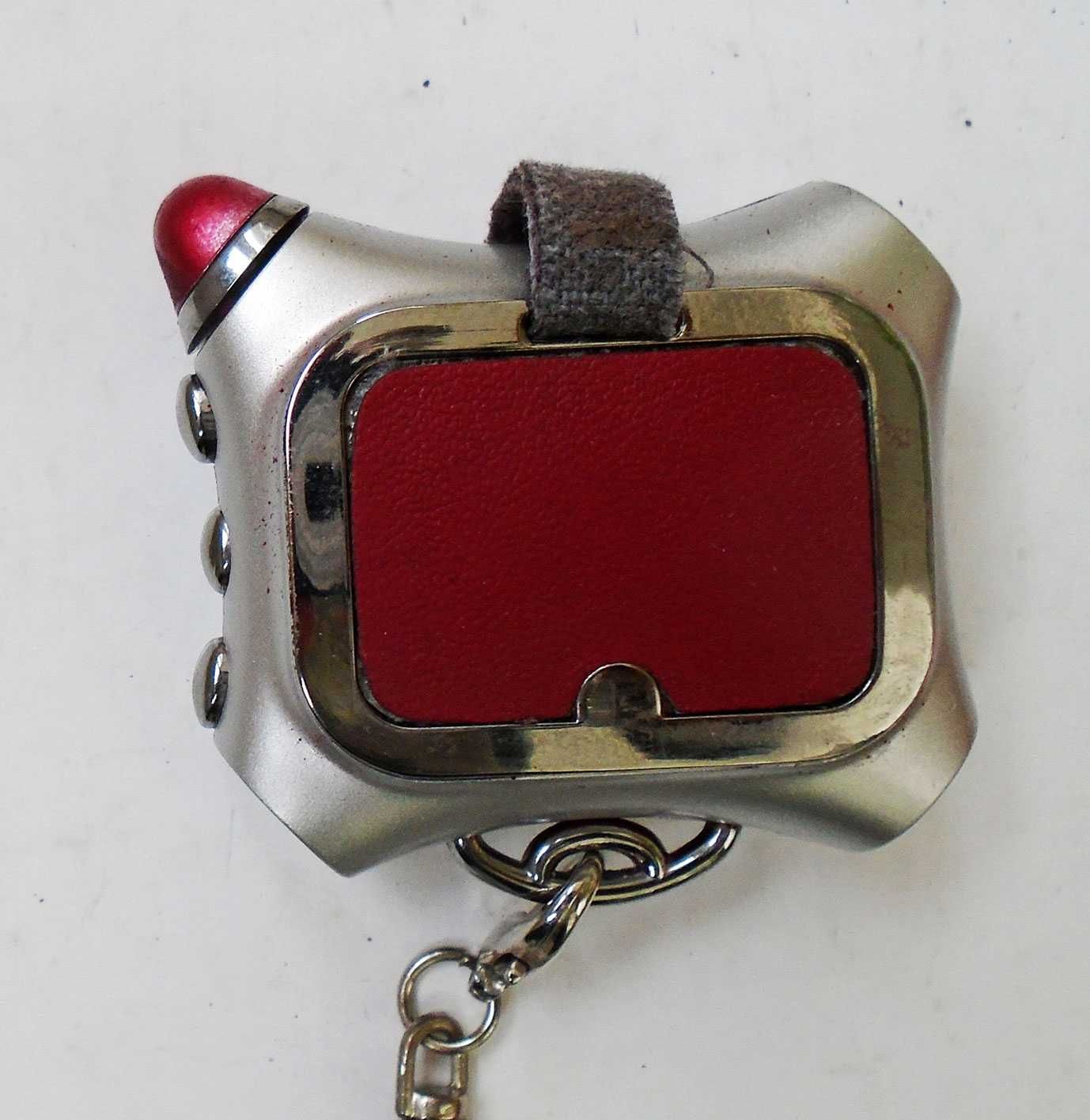 Цифровая фоторамка-брелок 1" Genius DPF-102K