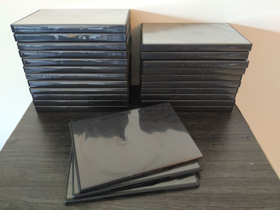 DVD-R novo (nunca aberto) + 43 Caixas arquivadoras de DVDs / CDs