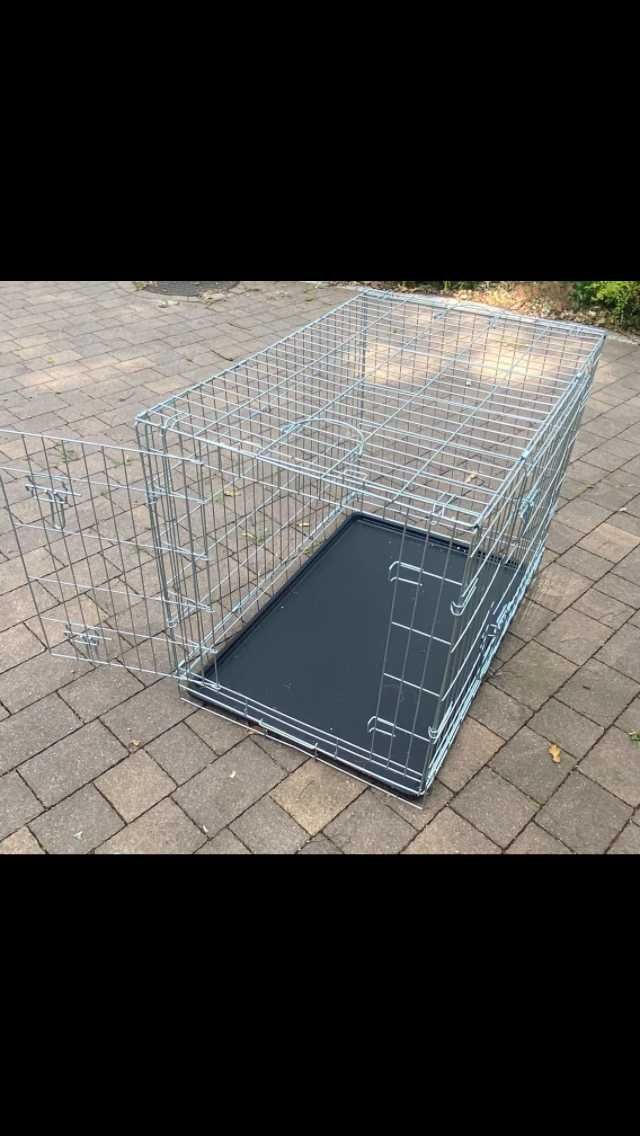 Metalowa klatka dla psa