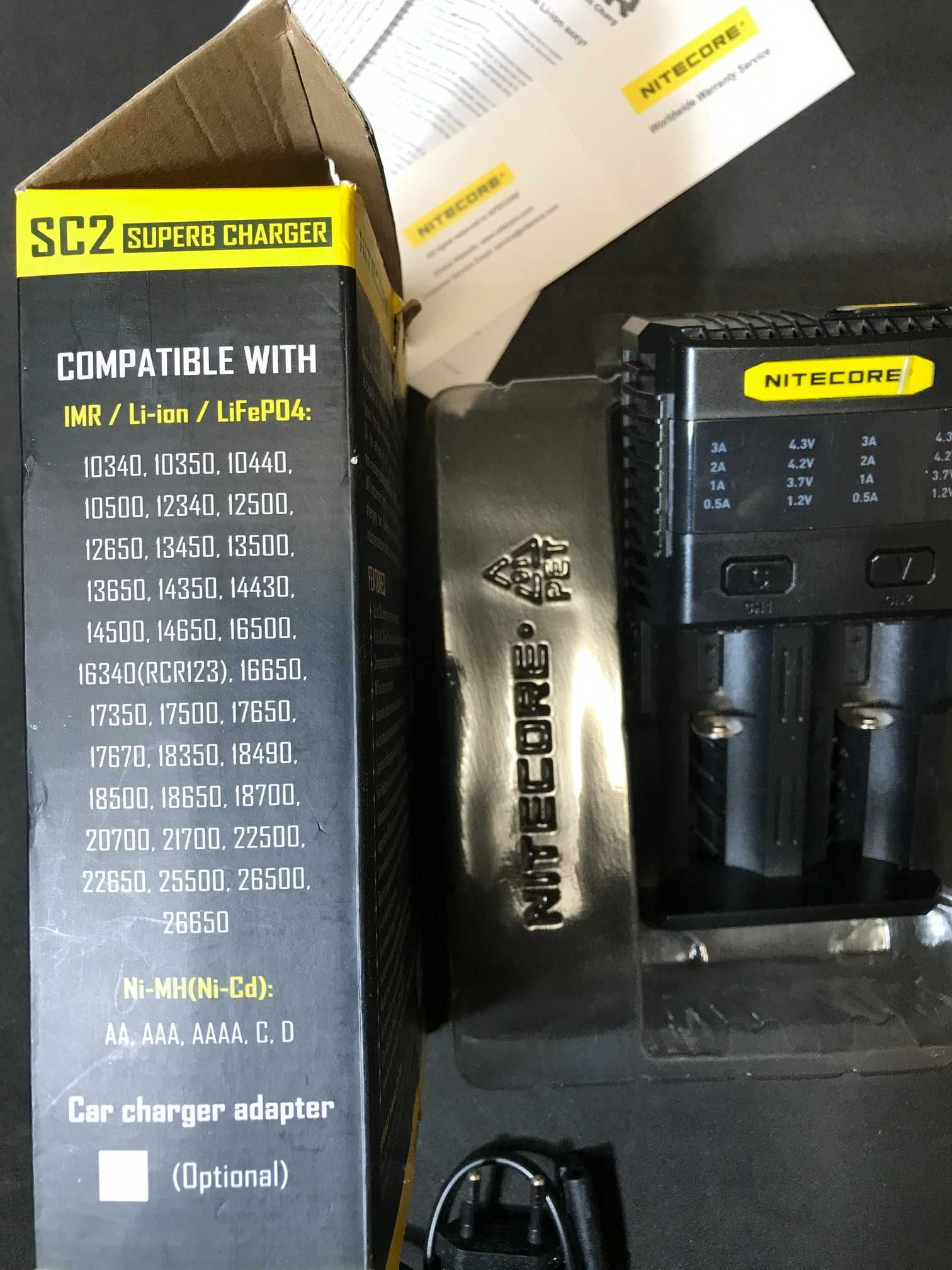 Продам универсальное зарядное устройство Nitecore SC2 Superb Charger