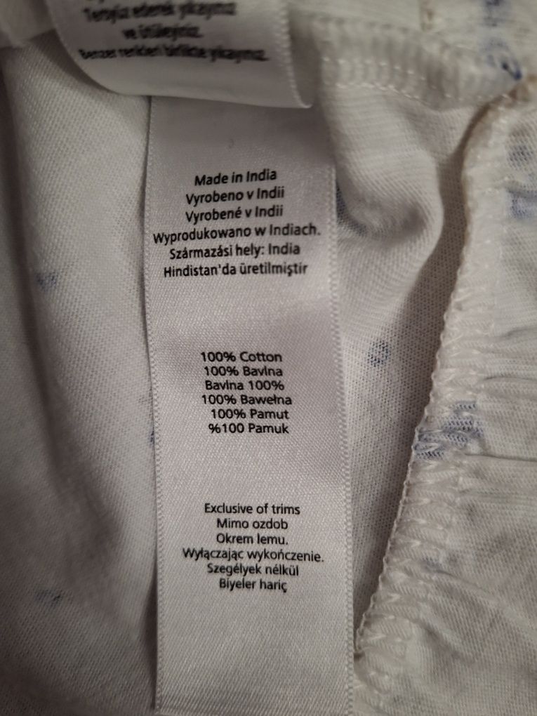 Śliczna bluzeczka z falbanką, r.74 stan bdb
Bawełna 100%

Wymiary +/-