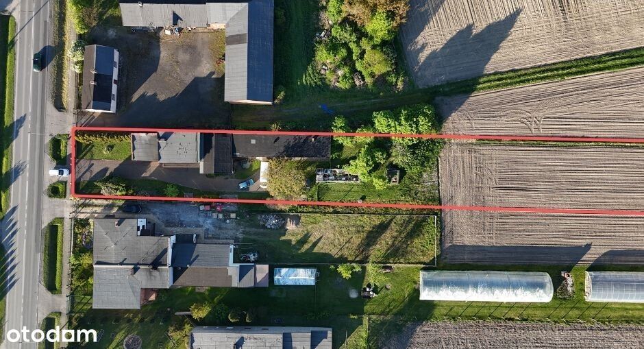 Dom z garażem, bud. gospodarczymi i działką rolną