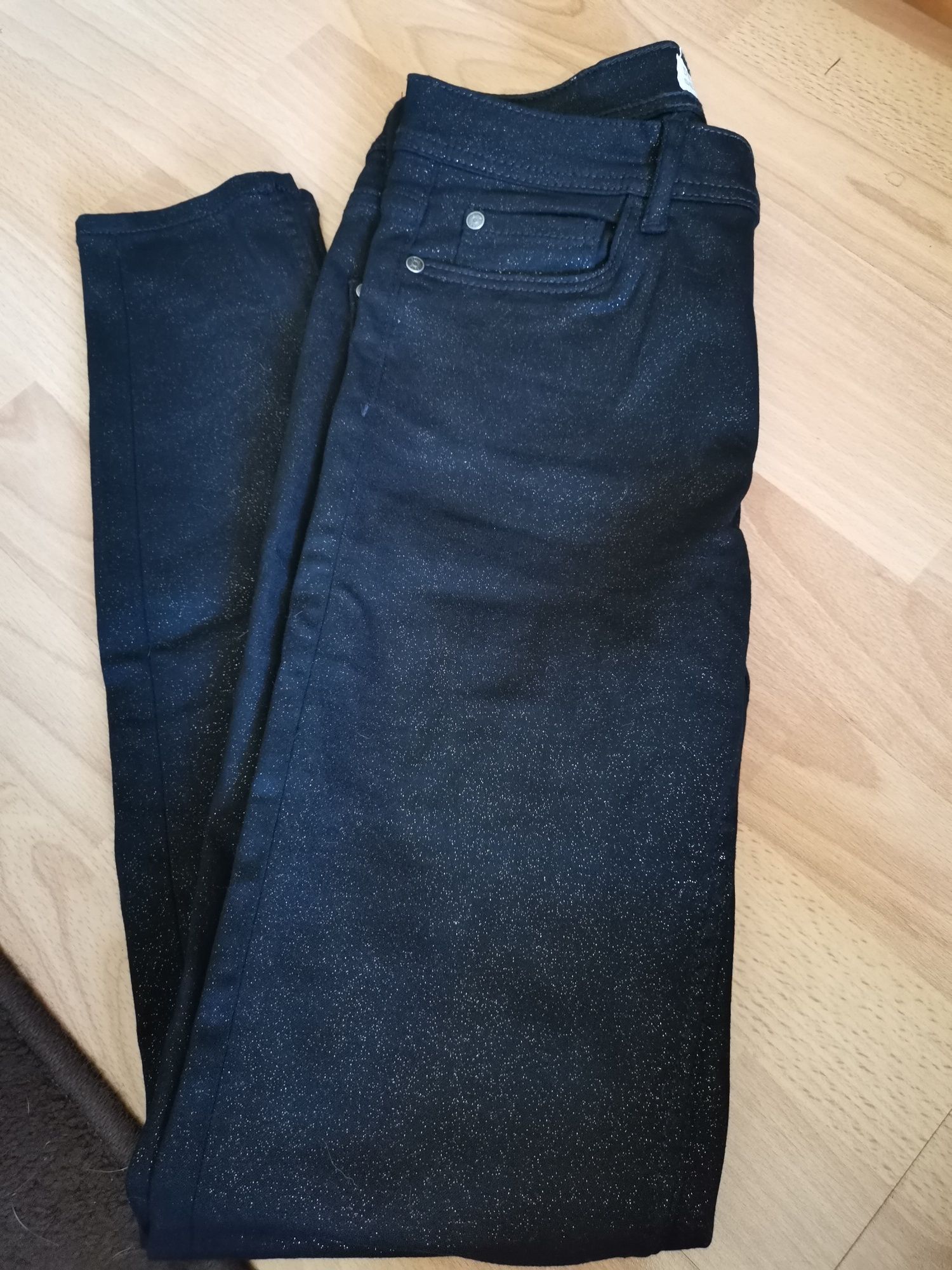 Spodnie z połyskującym brokatem Esmara r. 38