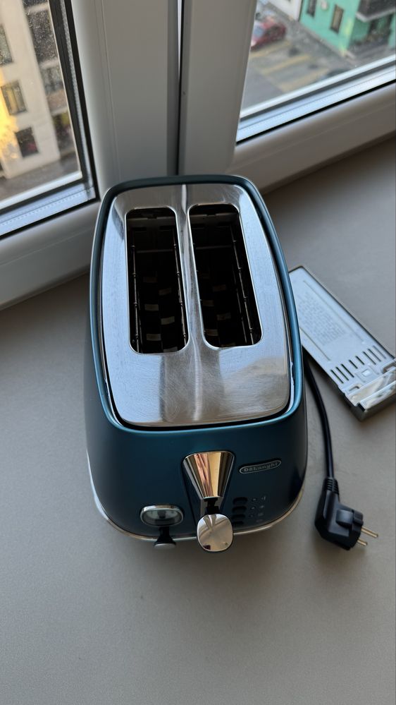 Тостер Delonghi синього кольору