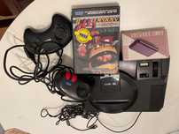 Sega Mega Drive com jogo e adaptador