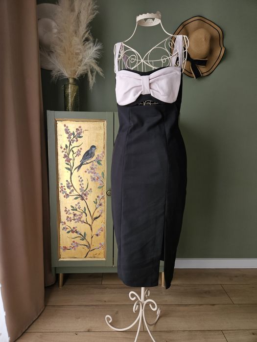 Elegancka sukienka damska midi  Mohito z kokardą i wycięciem wesele