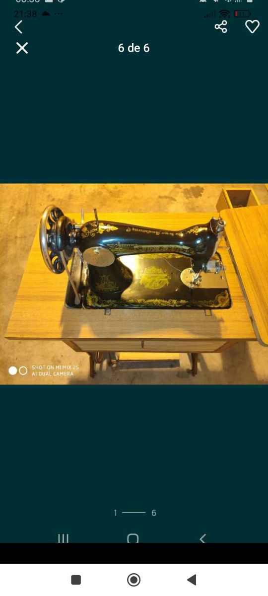 Máquina de costura singer