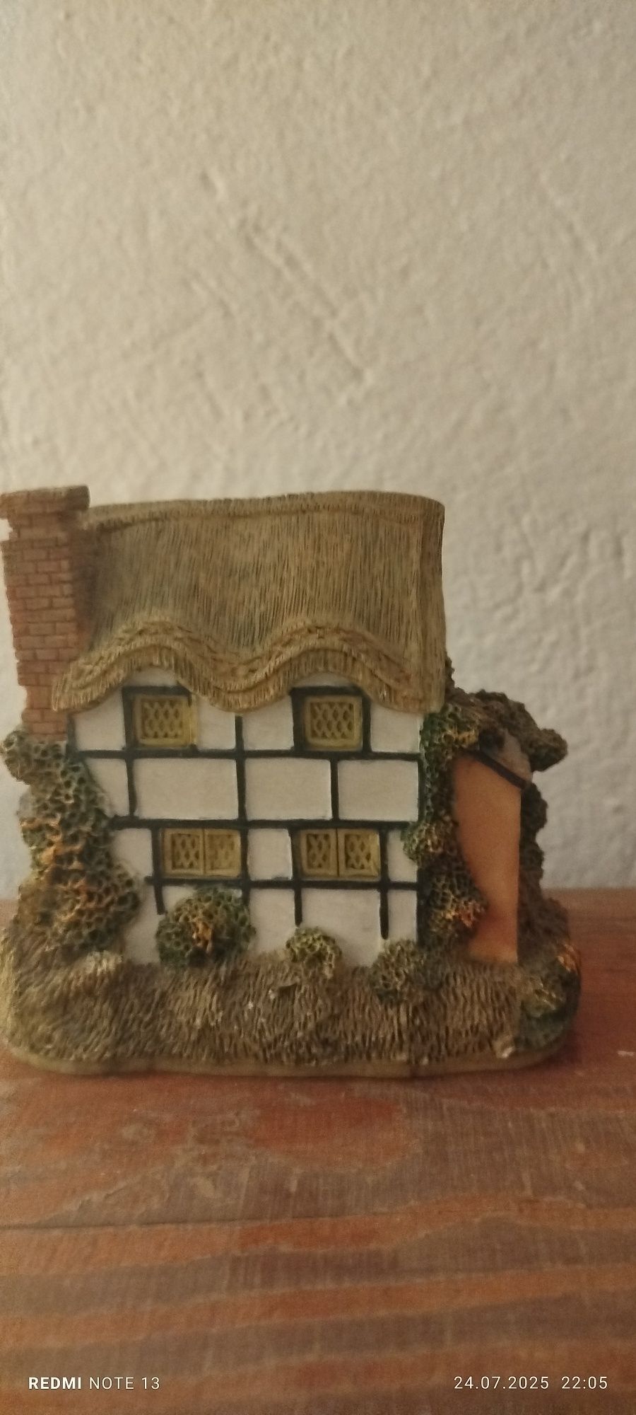 Zegarek w figurce domek