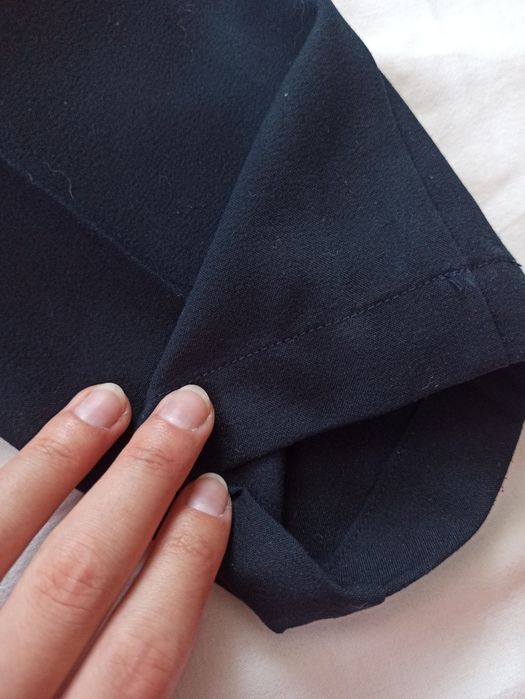 Темно-сині брюки carrot з защипами