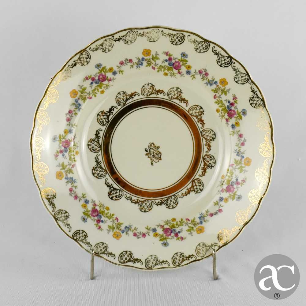 Prato em porcelana Artibus, ricamente de corado com flores e dourados