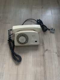 Stary beżowy telefon stacjonarny RWT Elektrim ASTER-72 z tarczą