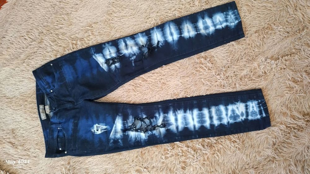 Жіночі фірмові джинси