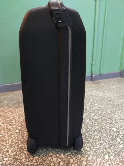Duża Walizka podróżna turystycznyczna pancerna  Samsonite na 2 kółkach