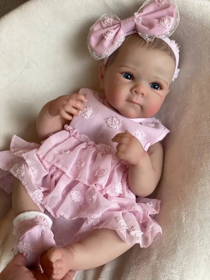 Boneca bebe reborn com corpo em vinil