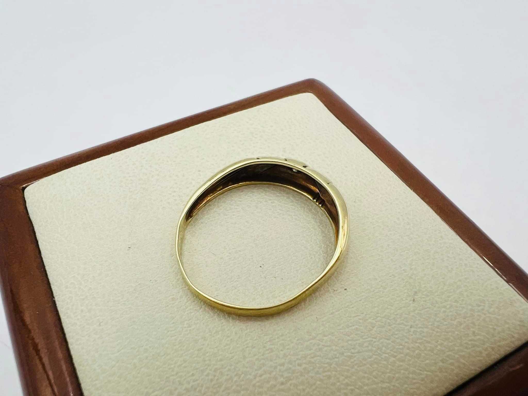 Złoty pierścionek próba 585 z diamentem + certyfikat 1,37g