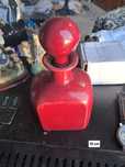 Frasco de perfume vermelho