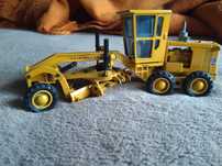 Miniaturas de máquinas retro-escavadoras Caterpillar
