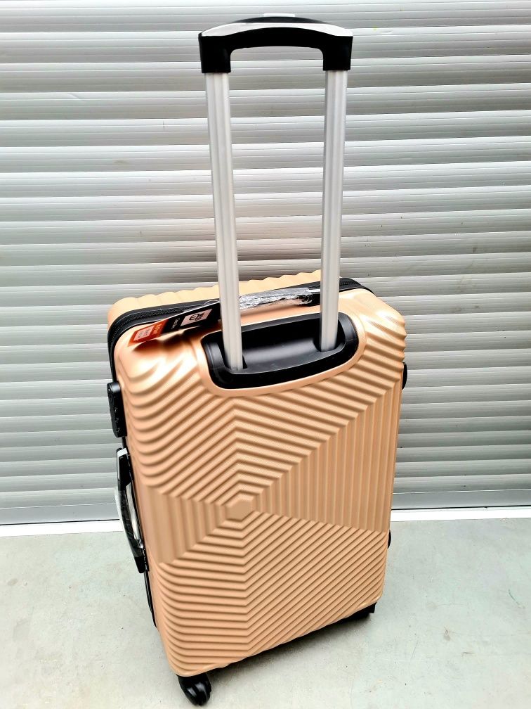 Nowa plastikowa walizka podróżna Cocodivo Large złota