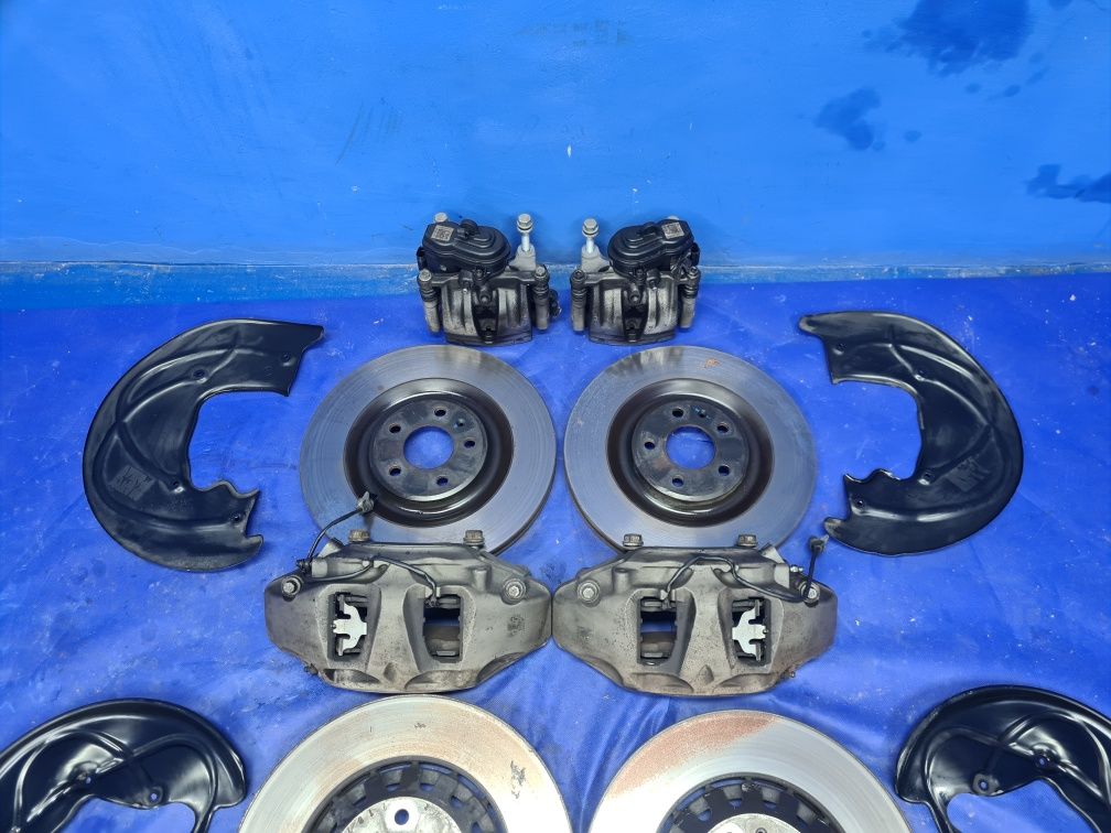 KOMPLET tarcz 375mm 340mm zaciski 6-tłoczkowe AUDI Q7 4M A6 C7 C8 OEM