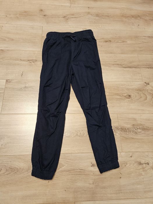 Spodnie chłopięce granatowe 134 H&M