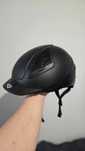 Kask jeździecki Uvex Reithelm exxential black mat M-L