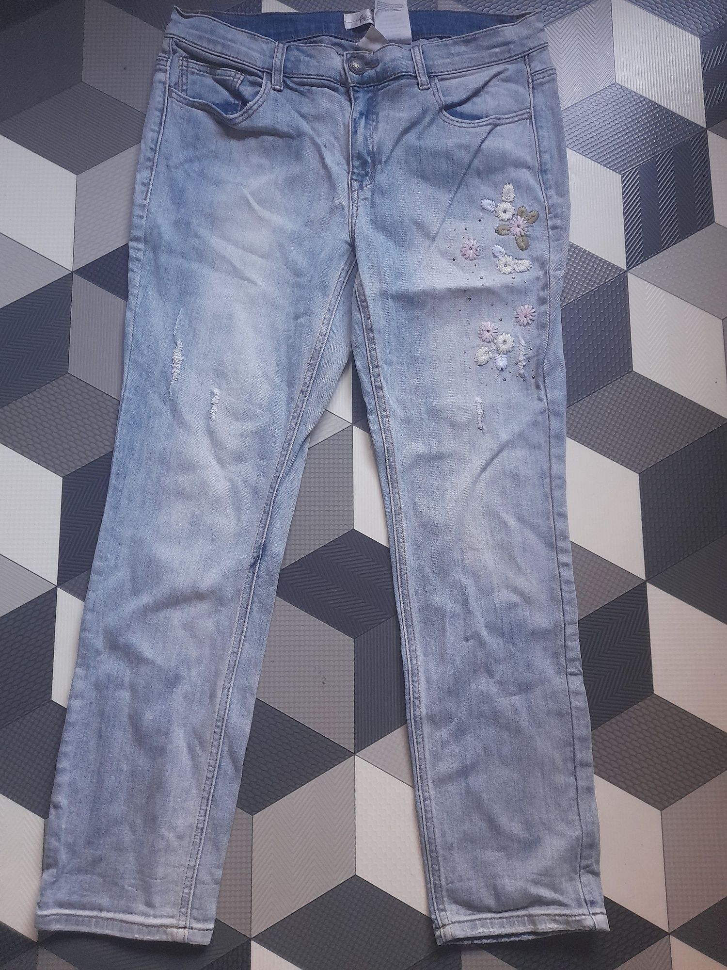 Spodnie jeans kwiaty roz L/xl