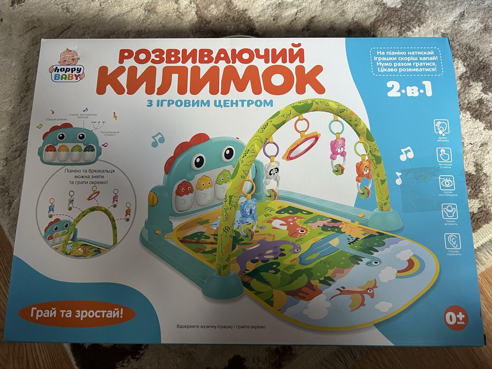 Новий розвиваючий килимок з ігровим центром