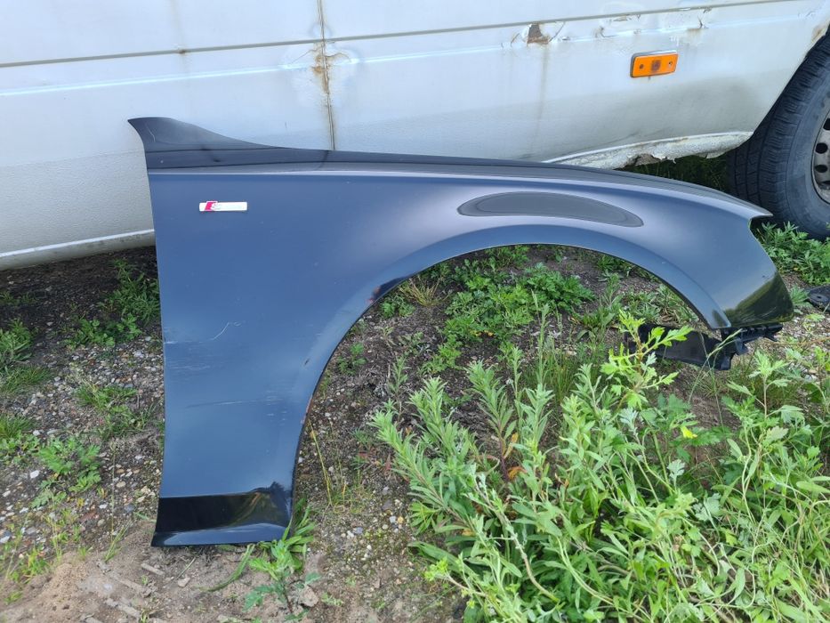 PRAWY BŁOTNIK przedni czarny przód AUDI A4 B8 2009r LZ9Y