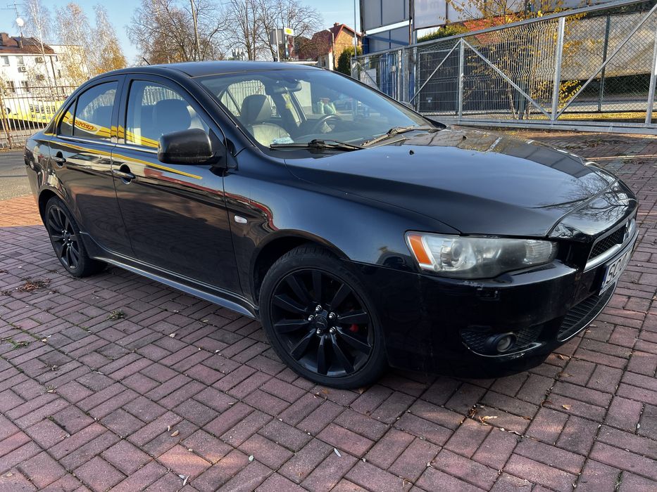 Lancer sb/sedan X evo ralliart czesci karoseria drzwi zderzak