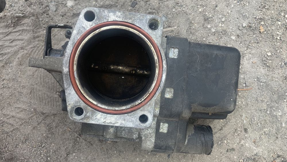 Дроссельная заслонка BMW E46 E39 E38 M52TU 1433414 hella 007623