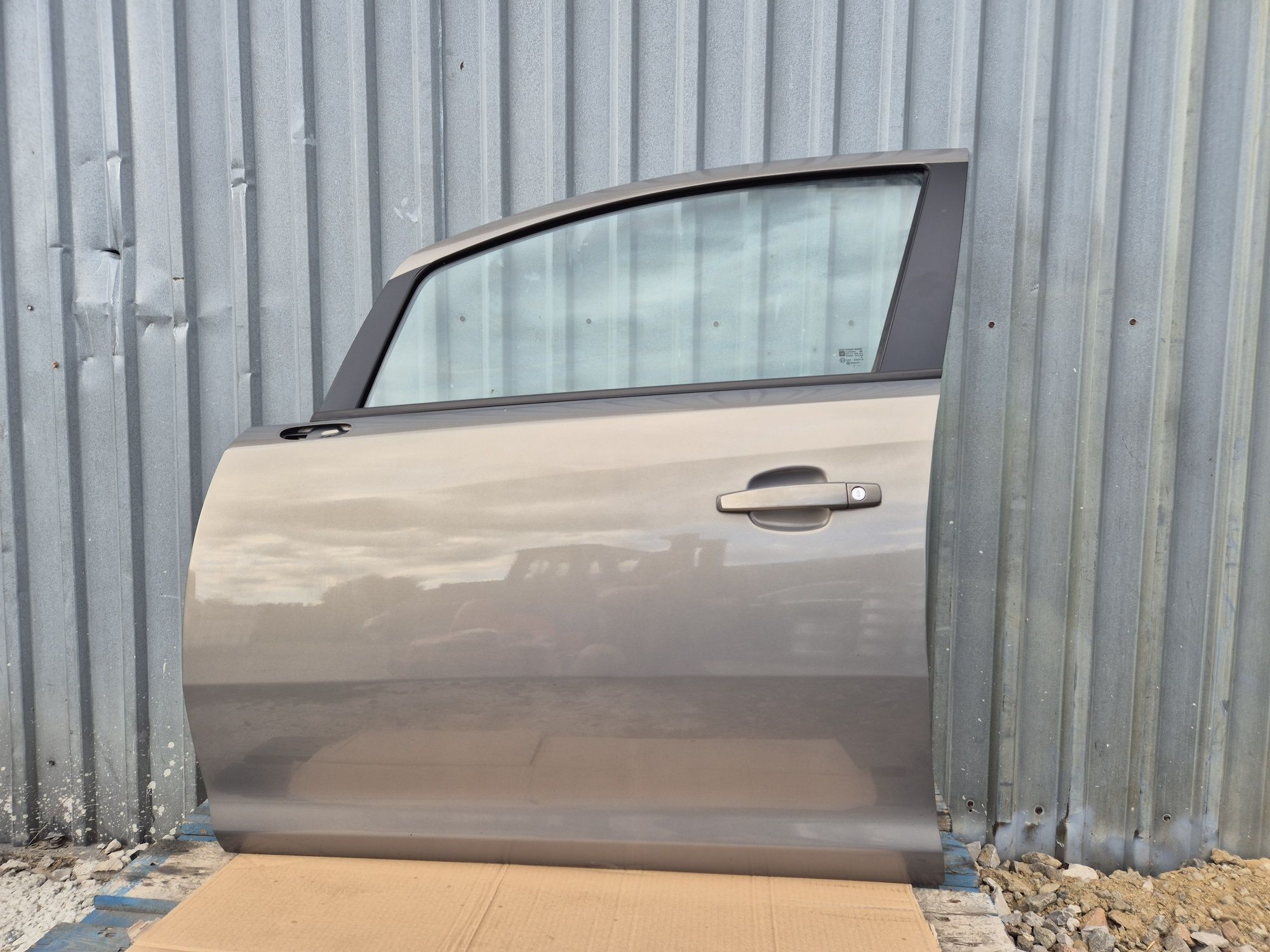 Drzwi lewe przednie Opel Corsa D  Z40W  Oryginał
