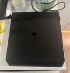Playstation 4 z 2 padami i 12 grami