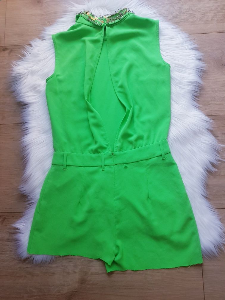 Neonowy kombinezon damski marki Missing In Clothes rozmiar XS/S.