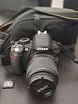 Nikon D3100 + objetiva