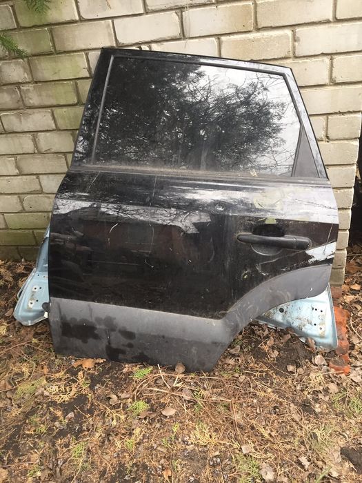 Двері Тюкстн 1 задня ліва