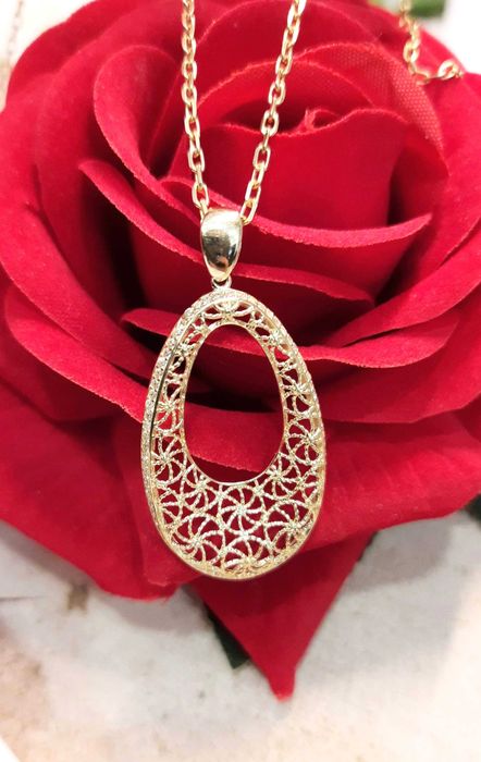 Złota zawieszka p.585/3,01g  ażurowa łezka