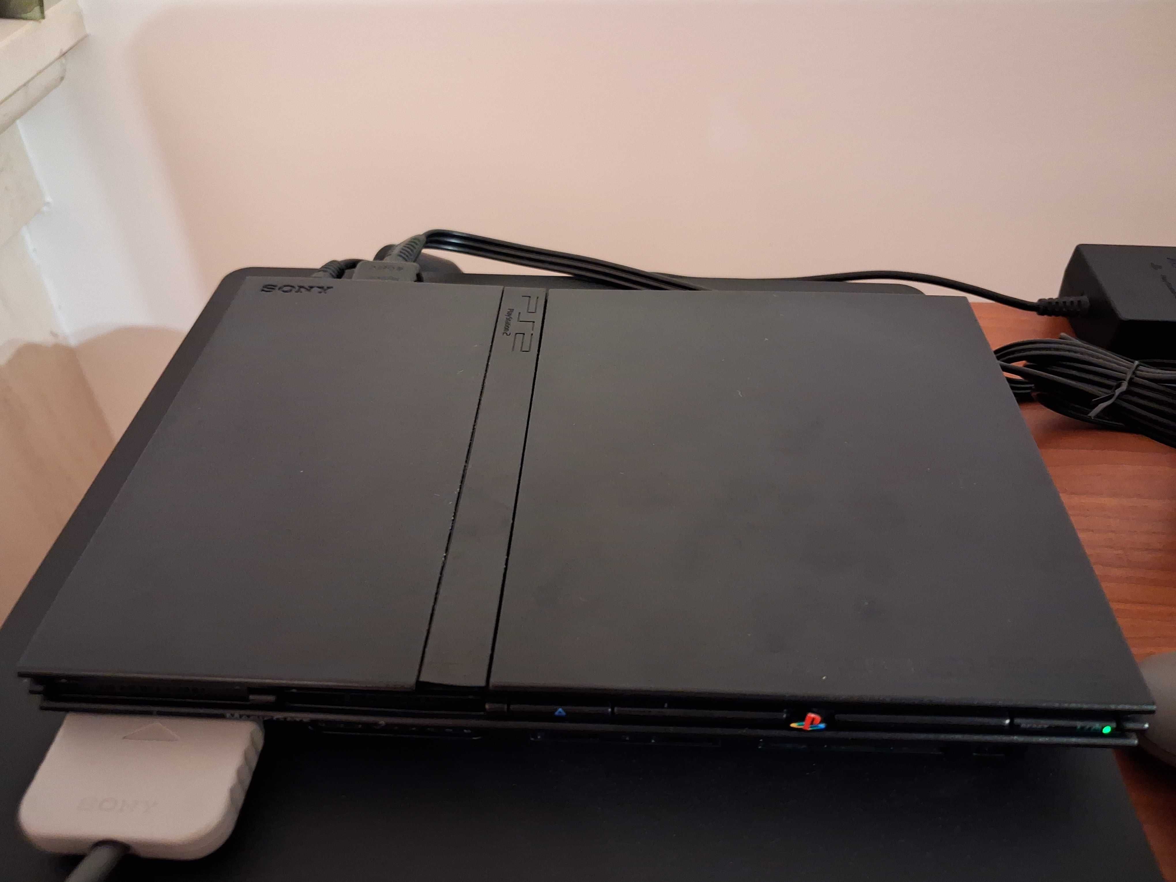 Consola Sony Playstation PS2 + comandos + cartões de memória.