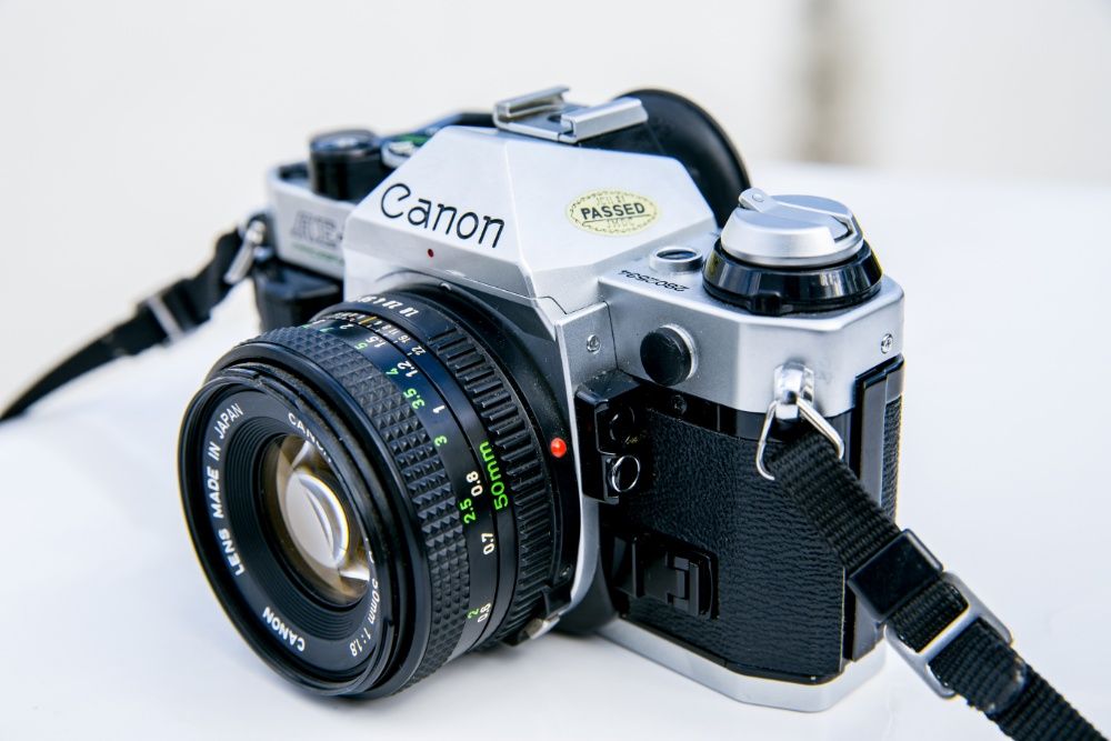 Canon Ae-1 Program + Lente 50mm F1.8 - EXCELENTE