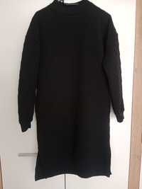 Czarna sukienka z kieszeniami fashion sweterkowa