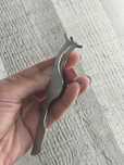 Pinça para pestanas postiças