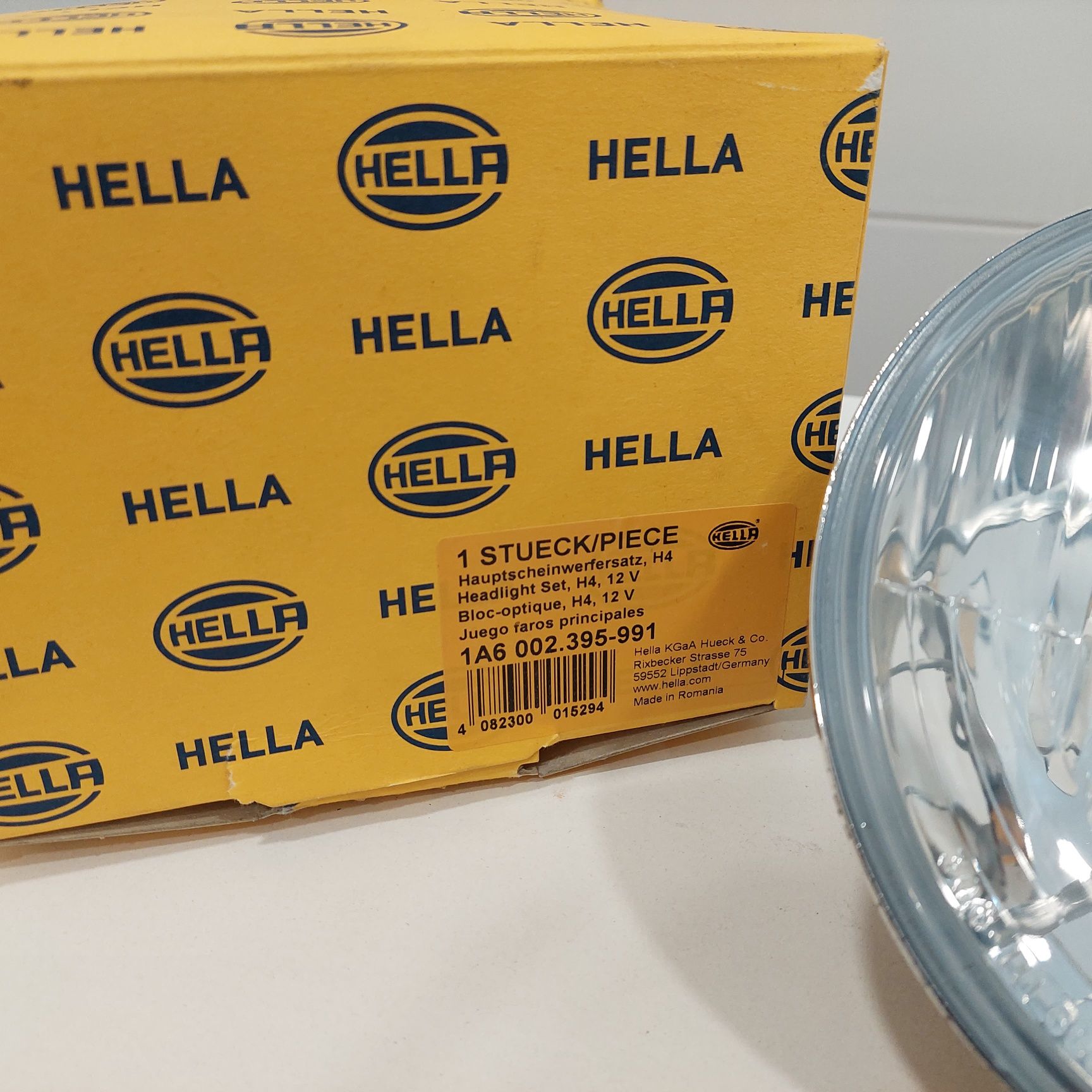 Farol Hella H4 12v