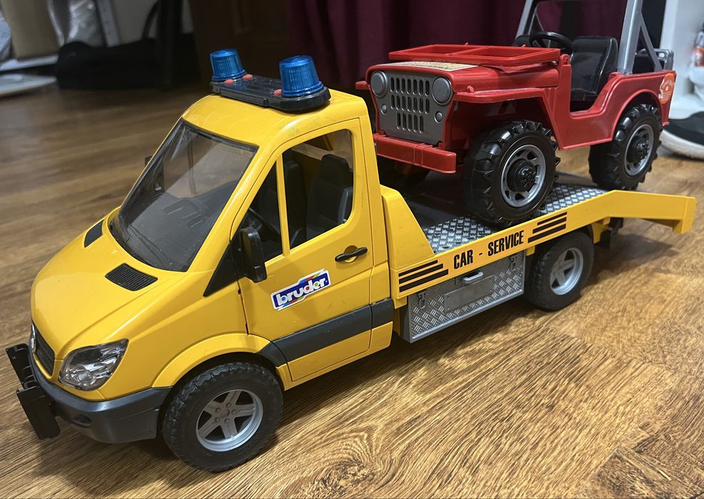 bruder машина эвакуатор с джипом