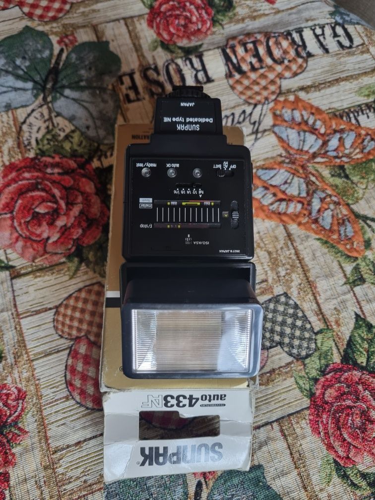 Спалах Minolta Canon
