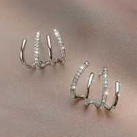 Eleganckie kolczyki w kształcie pazura - srebrne