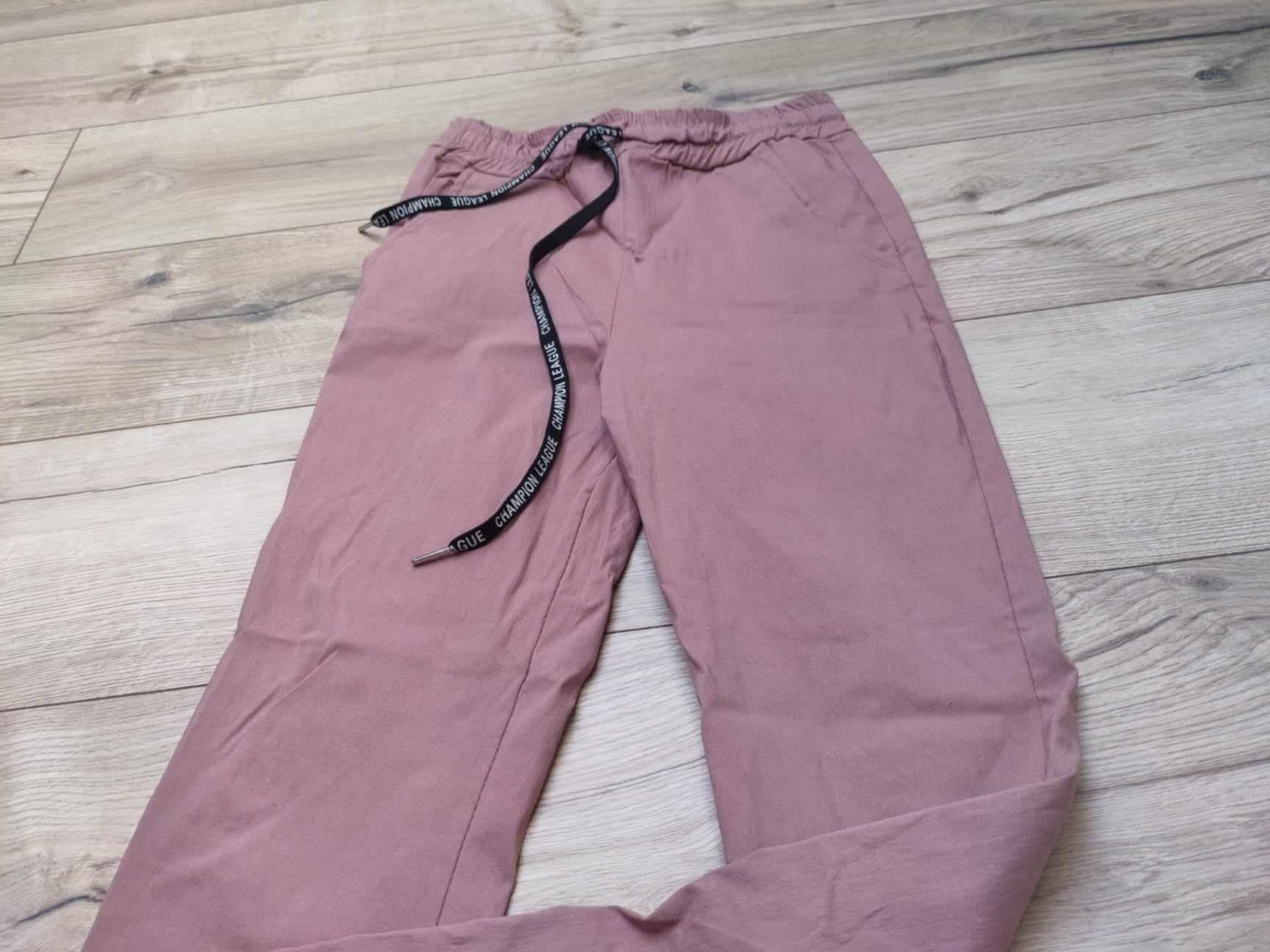 Różowe spodnie legginsy z sznureczkami ciemny pudrowy róż