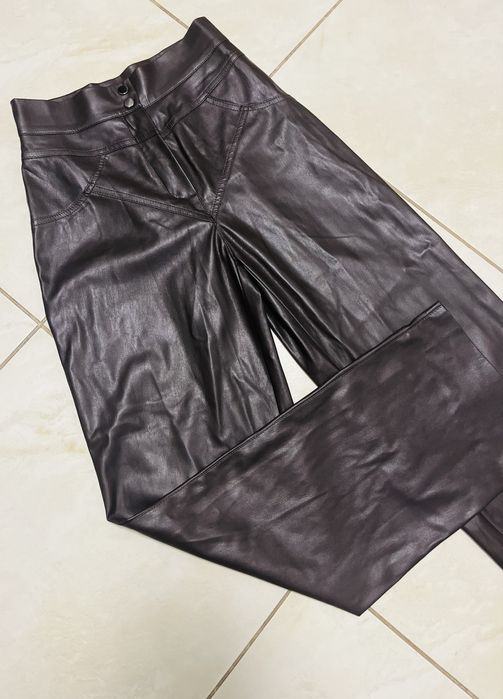 Кожзам штани широкі труби