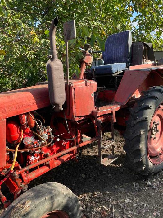 Трактор Т25 з культиватором, картоплекопалкою, прицепом з документами.